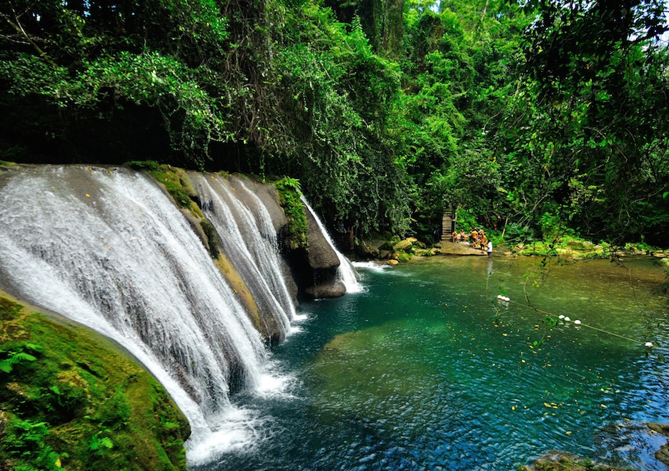 Reach Falls surrounded by tropical forest in Portland, Jamaica