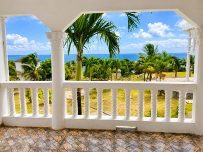 Coastal balcony view from Rooms 5 and 6 at Da Villa Juanita