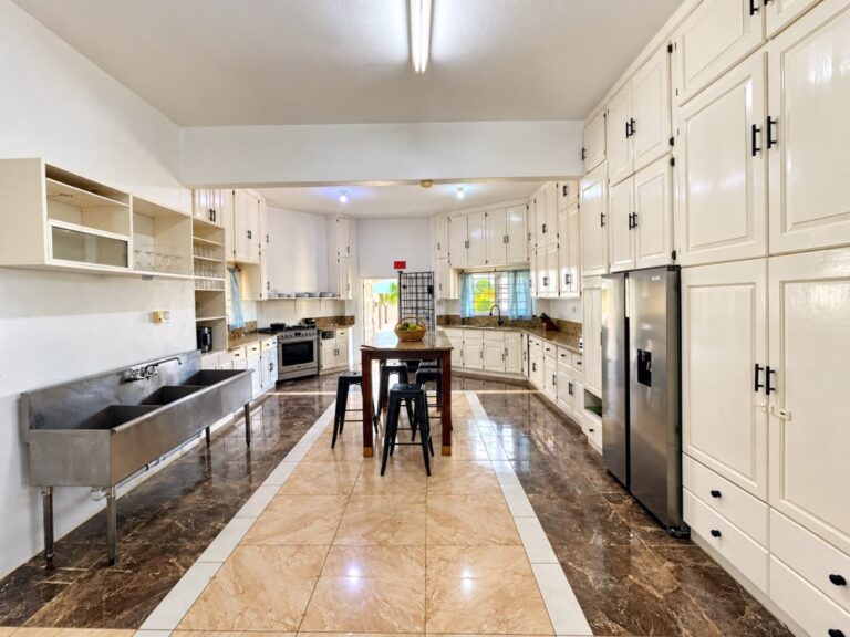 Bright wide view of the Grand Pavilion kitchen at Da Villa Juanita